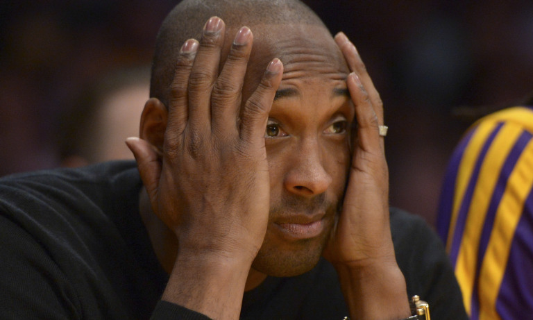 Dec 31, 2013; Los Angeles, CA, USA; Los Angeles Lakers guard Kobe Bryant (24) reacts in the fourth quarter against the Milwaukee Bucks at Staples Center. The Bucks defeated the Lakers 94-79. Mandatory Credit: Kirby Lee-USA TODAY Sports ORG XMIT: USATSI-140410 ORIG FILE ID:  20131231_krj_al2_392.JPG